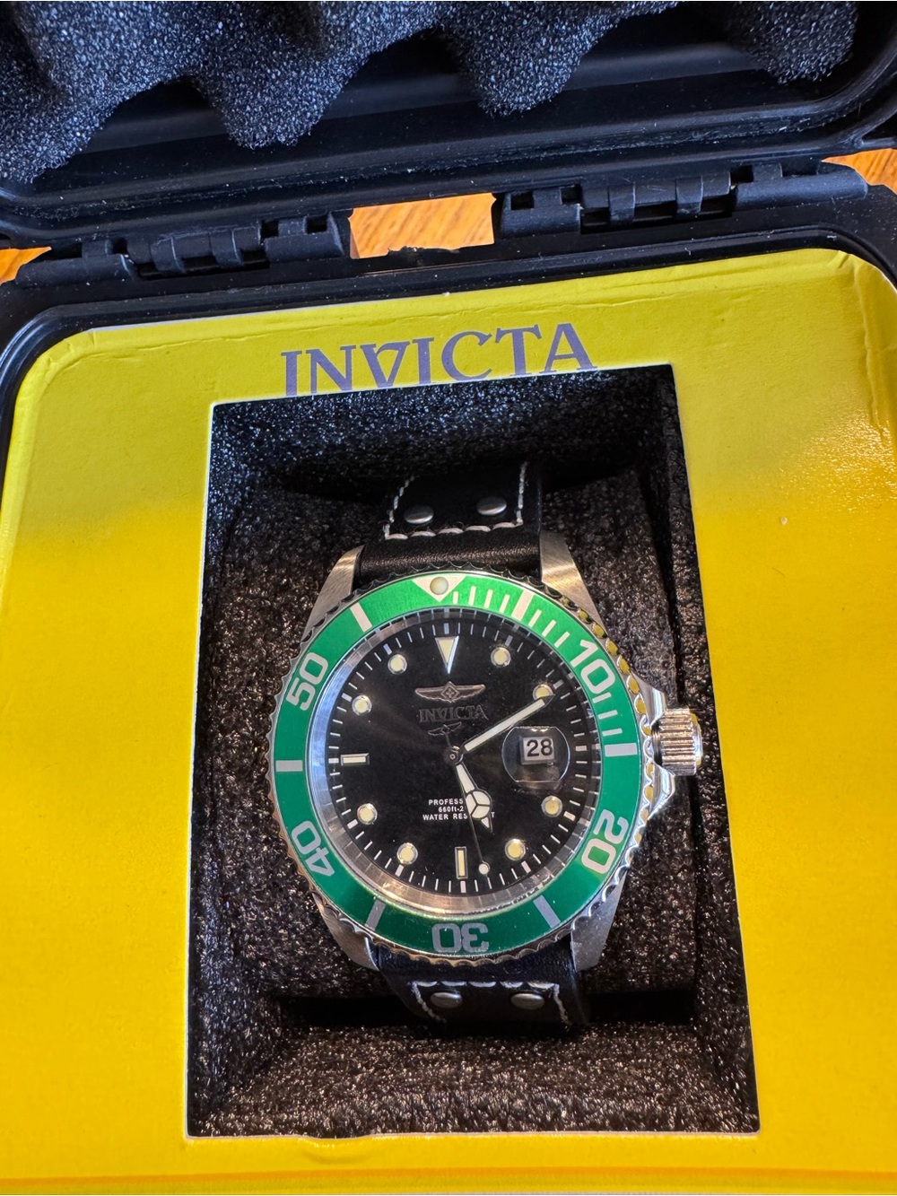 Invicta Men's Black Dial Watch with Green Bezel and Black Strap